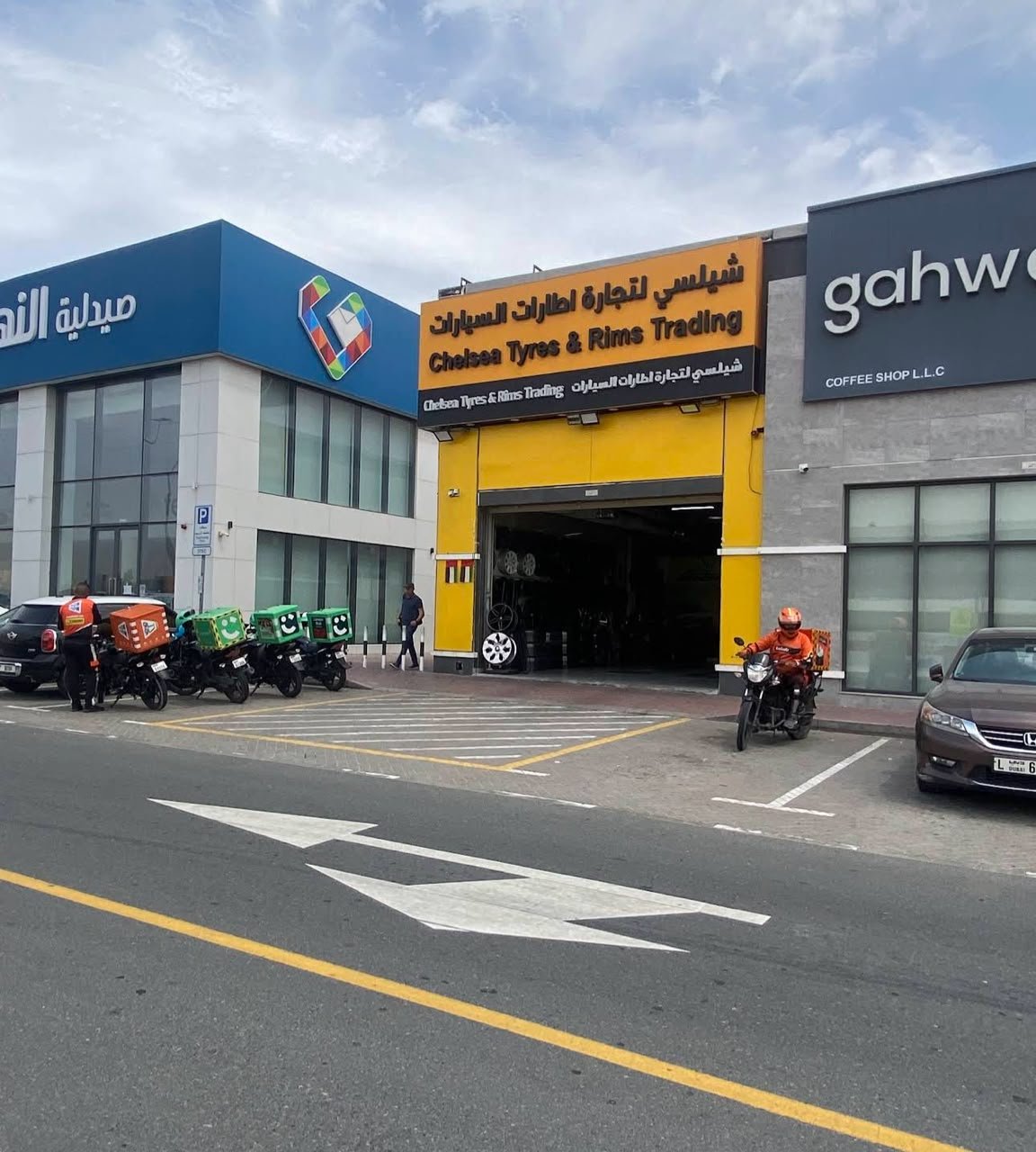 Chelsea Tyres And Rim Trading storefront in Dubai with signature yellow and black building exterior